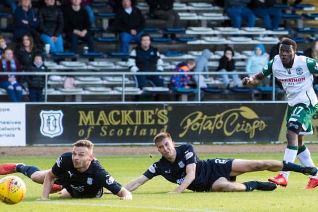 Hibs' Thomas Agyepong scores against Dundee to make it 3-0. Picture: Ross Parker/SNS
