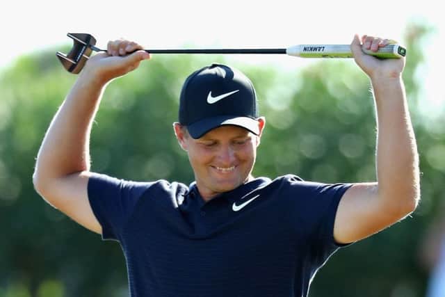 Tom Lewis of England celebrates after winning the Portugal Masters in Albufeira. Picture: Warren Little/Getty