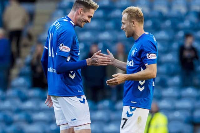 Kyle Lafferty and Scott Arfield celebrate victory over St Johnstone. Picture: SNS Group