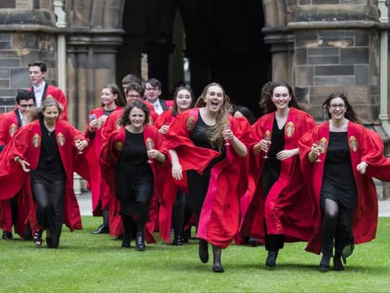 Students celebrate graduation day at the University of Glasgow. Picture: John Devlin