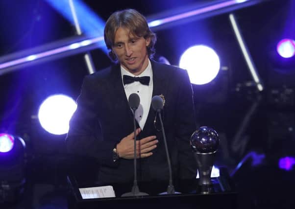 Croatia's Luka Modric receives the Best Fifa Men's Player award. Picture: Frank Augstein/AP