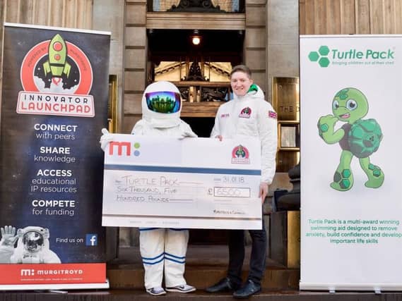 The winner of the Autumn 2018 Innovator Launchpad Michael Harkins is presented with his cheque. Picture: TSPL