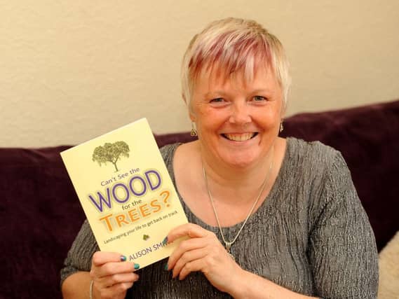 Alison and her book. Pics by Fife Photo Agency