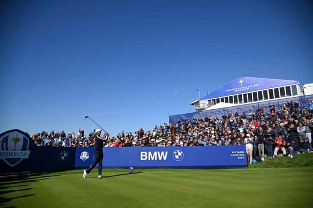 Tiger Woods draws the crowds during practice at Le Golf National.