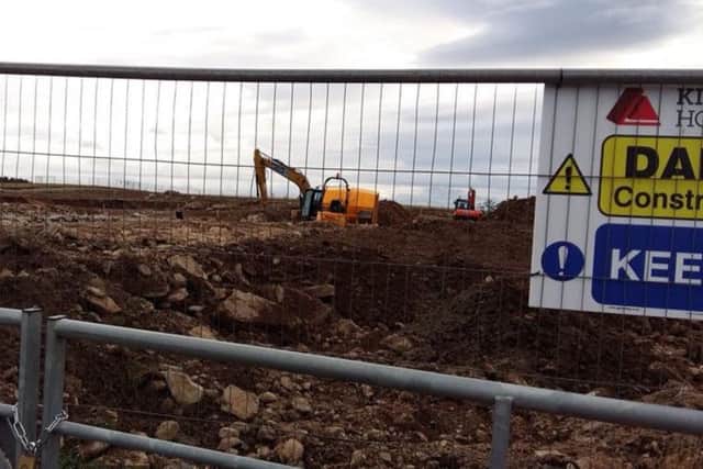 Diggers break ground at Viewhill Farm. PIC: Andrew Duncan/Group to Stop Development at Culloden.