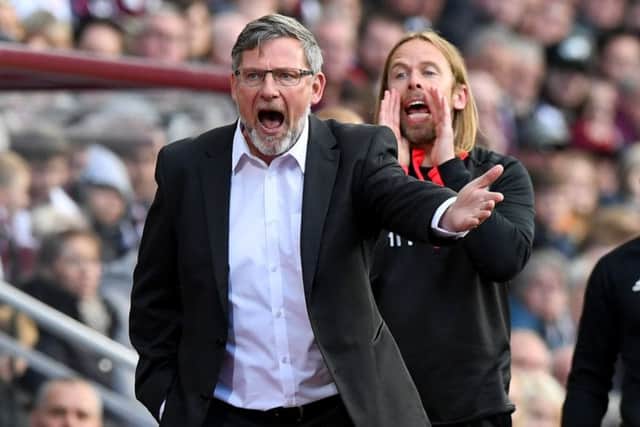 Hearts manager Craig Levein and assistant Austin MacPhee shout out instructions to their players during Saturday's goalless draw with Livingston. Picture: SNS