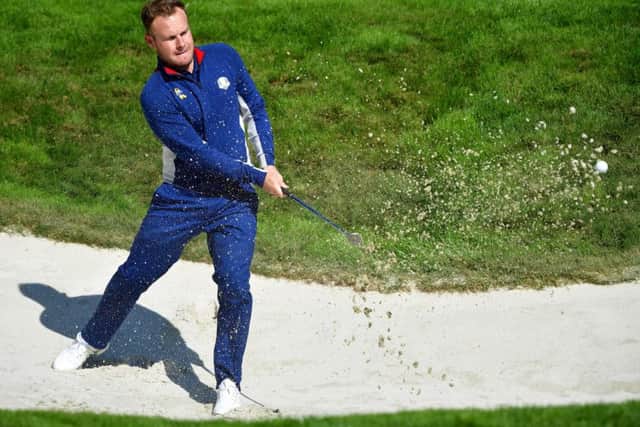 Europe's Tyrrell Hatton plays from a bunker during practice ahead of the 2018 Ryder Cup. Picture: Stuart Franklin/Getty Images