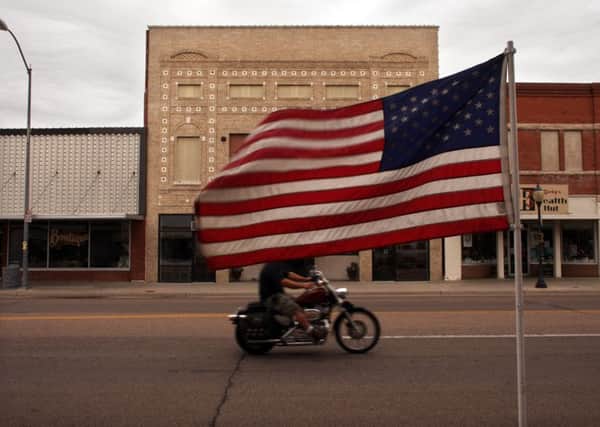 Sixty per cent of those who voted in Nebraska backed Donald Trump, but his approval rating has now hit 50 per cent (Picture: Spencer Platt)