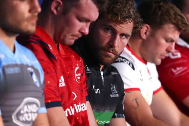 Callum Gibbins sneeks a peak at the opposition during the Celtic launch of the Heineken Champions Cup in Dublin.
