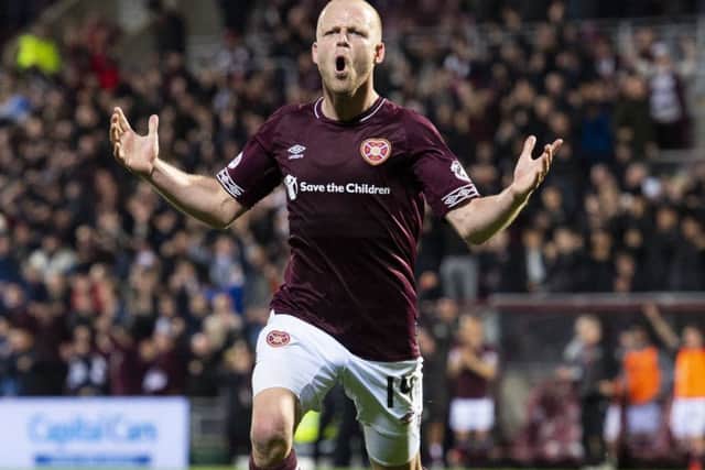 Steven Naismith celebrates scoring Hearts' fourth goal. Picture: SNS Group
