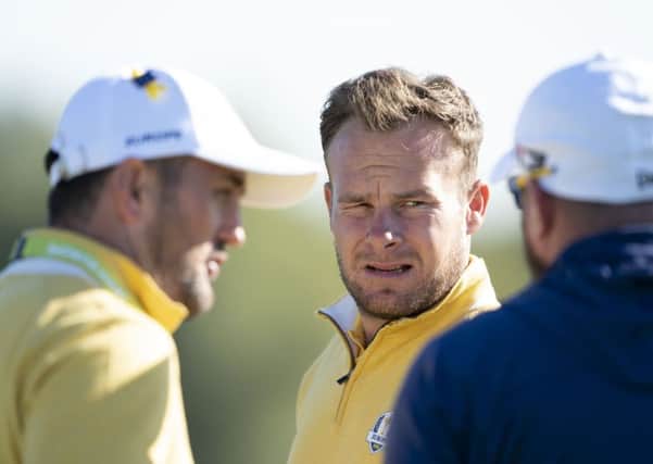 Europe's Tyrrell Hatton with his Scottish caddie Mark Crane during Ryder Cup practice. Picture: Tom Russo