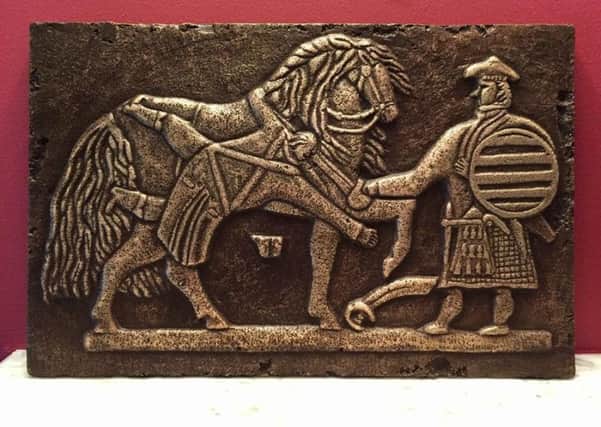 The bronze plaque which has been cast using detail from Big Duncan MacKenzie's gravestone. PIC: Contributed.