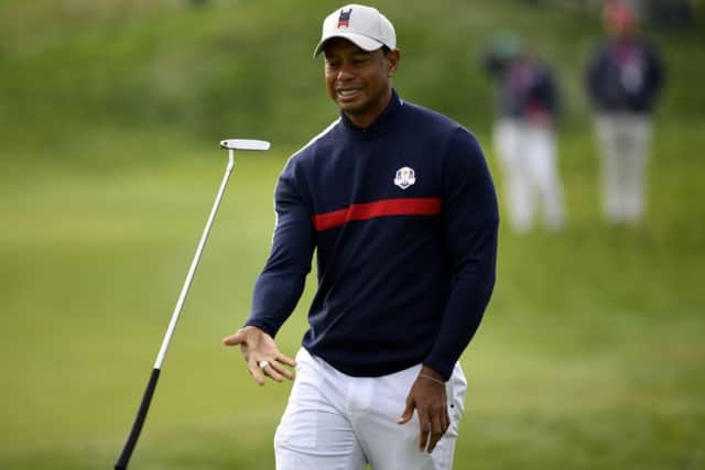 Tiger Woods suffered the only US defeat in the fourballs. Picture: AFP/Getty
