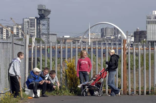 Holyrood legislation set a number of targets for cutting child poverty including having just one in ten children living in relative poverty. Picture: TSPL