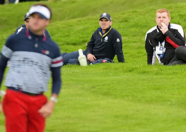 Neil Lennon, right, watches Bubba Watson at the 2014 Ryder Cup at Gleneagles. Picture: Alan Harvey/SNS
