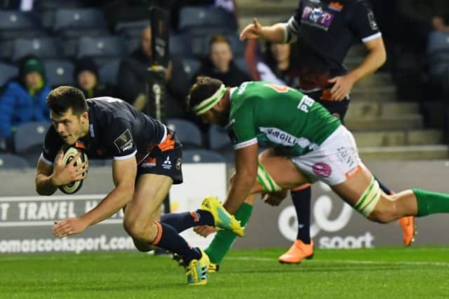 Blair Kinghorn crosses for Edinburghs third try against Benetton at Murrayfield.  Picture: SNS/SRU