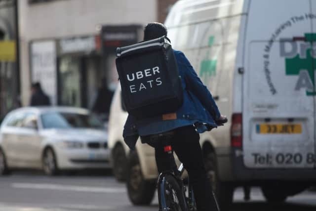 Uber Eats couriers are calling for a minimum drop fee of Â£5 a delivery. Photograph: Getty Images