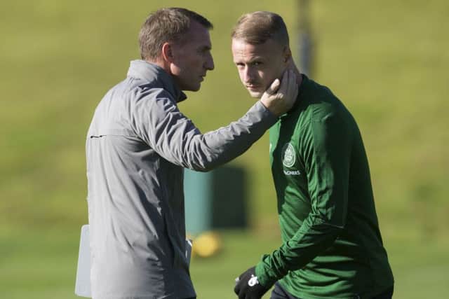 Brendan Rodgers in discussion with striker, Leigh Griffiths. Pic: SNS