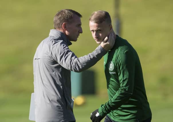 Brendan Rodgers in discussion with striker, Leigh Griffiths. Pic: SNS
