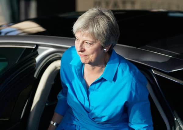 Prime Minister Theresa May arrives yesterday at the Hyatt Regency on the eve of the annual Conservative Party Conference in Birmingham. Picture: Christopher Furlong/Getty