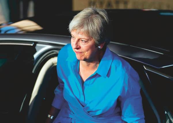 Prime Minister Theresa May arrives yesterday at the Hyatt Regency on the eve of the annual Conservative Party Conference in Birmingham. Picture: Christopher Furlong/Getty