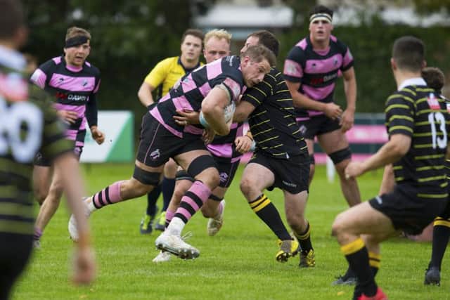 Blair MacPherson, with the ball, scored a try in Ayrs victory, in his first outing as captain for the league leaders. Picture: SNS/SRU