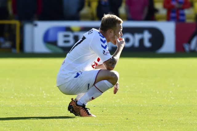 Rangers midfielder Scott Arfield looks dejected at full time. Picture: SNS