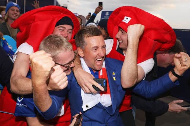 European Ryder Cup stalwart Ian Poulter  is mobbed by  his fans as the celebrations following yesterdays victory get into full swing. Picture: Getty.