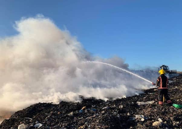 Fire at the Cambridge landfill site where the body of missing airman Corrie McKeague is believed to be buried. Picture: SWNS