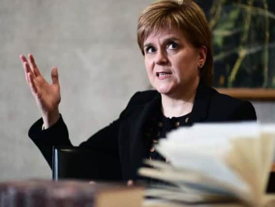 Nicola Sturgeon has revealed plans for a 'national converstion' on whether councils should get tourist tax powers.