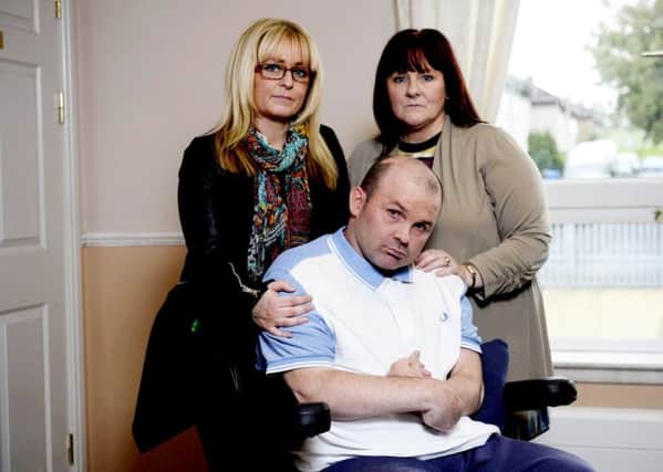 Sister Lyndsey (L) and mum Helen (R) are desperate to have Kevin back in his Cardonald home.  Picture: SWNS