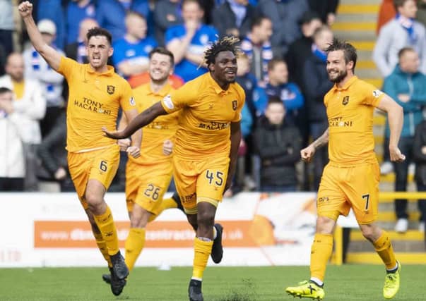 Livingston's Dolly Menga celebrates his goal against Rangers. Picture: SNS/Craig Williamson