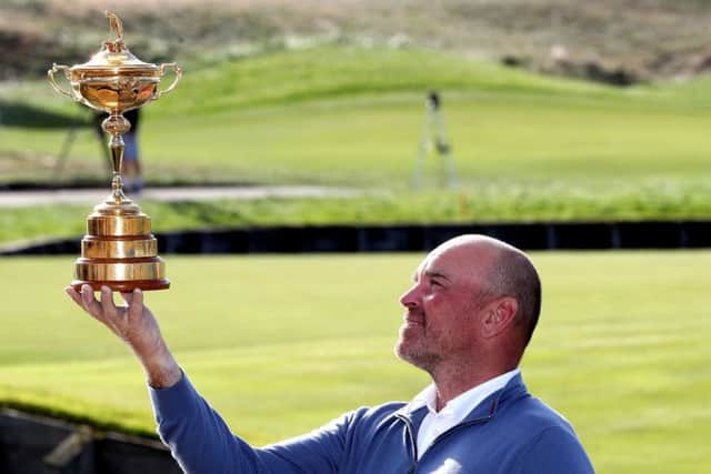 Europe captain Thomas Bjorn with the Ryder Cup at Le Golf National.