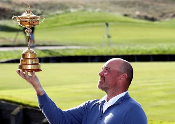 Europe captain Thomas Bjorn with the Ryder Cup at Le Golf National.
