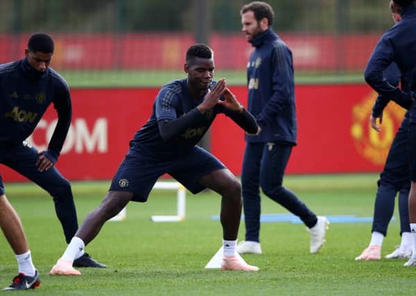 Manchester United midfielder Paul Pogba trains yesterday ahead of tonights  clash with Valencia. Picture: Getty.
