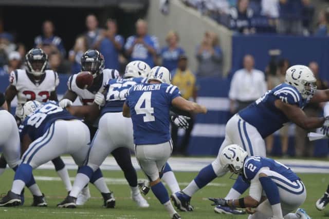 Indianapolis Colts kicker Adam Vinatieri kicks a 42-yard field goal, passing Morten Andersen for the most career field goals made in NFL history. Picture: AP