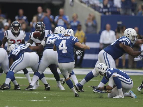 Indianapolis Colts kicker Adam Vinatieri kicks a 42-yard field goal, passing Morten Andersen for the most career field goals made in NFL history. Picture: AP