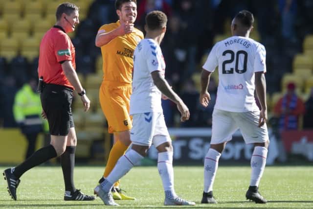 Declan Gallagher exchanges words with Alfredo Morelos after Livingston's 1-0 win over Rangers. Picture: SNS/Craig Williamson
