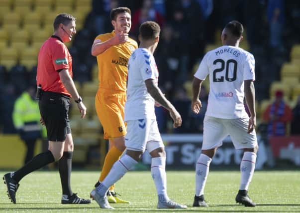 Declan Gallagher exchanges words with Alfredo Morelos after Livingston's 1-0 win over Rangers. Picture: SNS/Craig Williamson