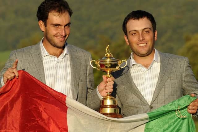 Edoardo, left, and Francesco Molinari pose with the Ryder Cup after helping Colin Montgomeries European team beat the US at Celtic Manor in 2010. Picture: AFP/Getty.