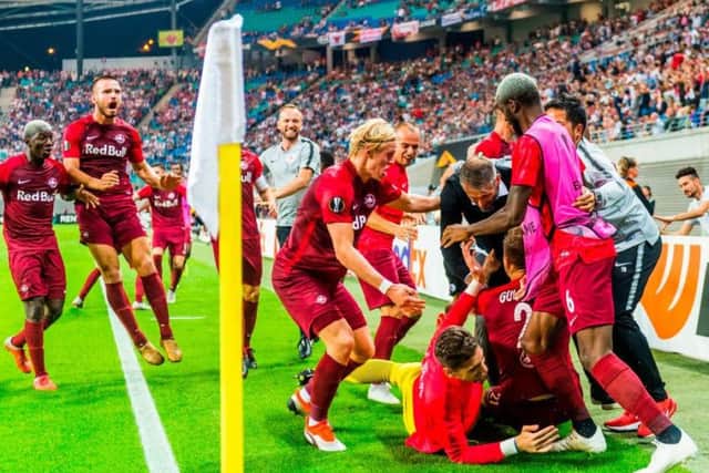 Salzburg celebrate the winning goal in the victory against RB Leipzig. Picture: ROBERT MICHAEL/AFP/Getty