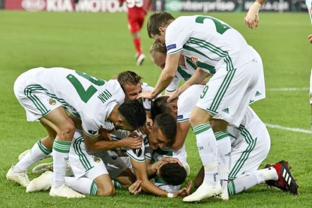 Rapid's players celebrate during their win over Spartak Moscow in Vienna. Picture: HANS PUNZ/AFP/Getty
