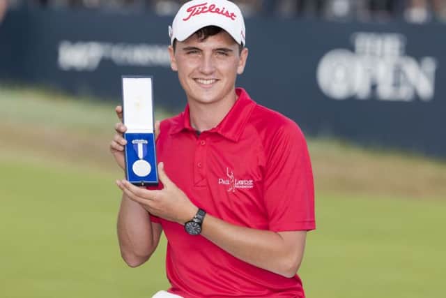 Scotland's Sam Locke receives the silver medal award as the leading amateur at the Open in July. Picture: Kenny Smith/SNS