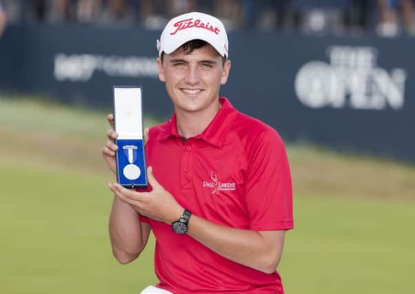 Scotland's Sam Locke receives the silver medal award as the leading amateur at the Open in July. Picture: Kenny Smith/SNS