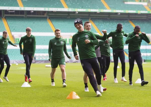 Leigh Griffiths leads training at Celtic Park on Wednesday ahead of the Europa League tie in Austria against Salzburg. Picture: SNS