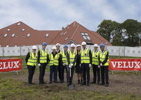 Councillor Altany Craik (left) with the Velux team before work begins on the office expansion. Picture: Velux