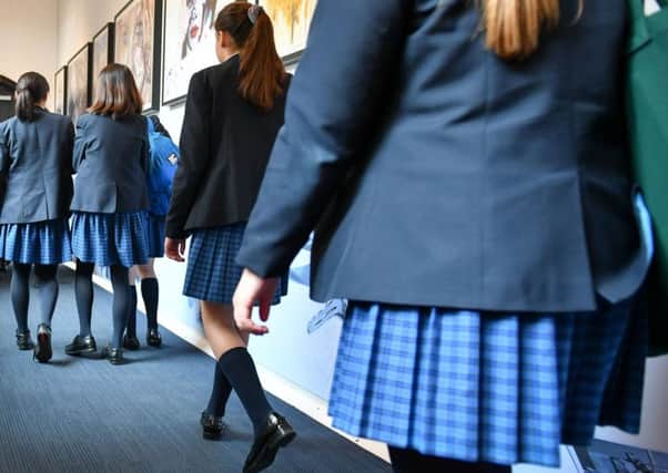 One in eight girls were 12 years old or younger when they first experienced unwanted sexual attention. Picture: PA