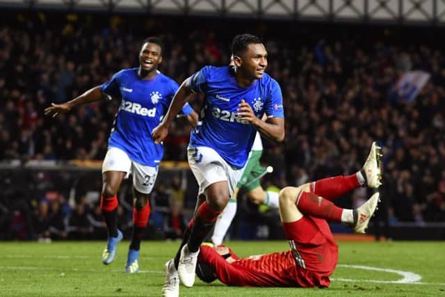 Rangers' Alfredo Morelos celebrates after he makes it 3-1. Picture: SNS