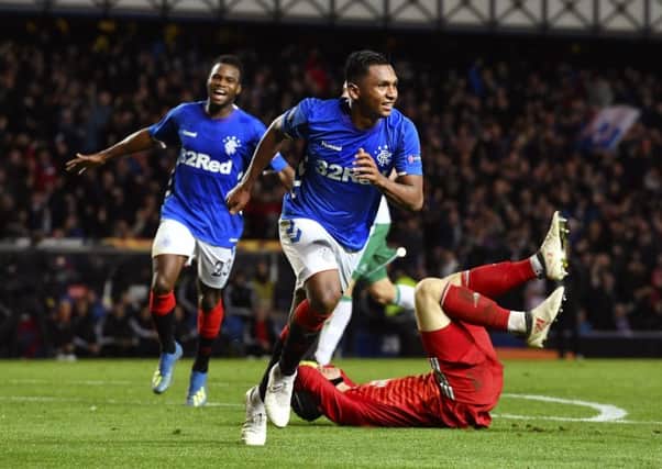 Rangers' Alfredo Morelos celebrates after he makes it 3-1. Picture: SNS