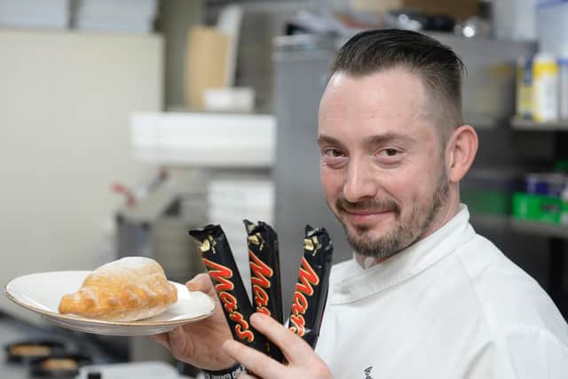 Fraser Walker, said the idea behind the deep fried Mars Bar calzone came from a simple conversation with the head chef (Photo: SWNS)